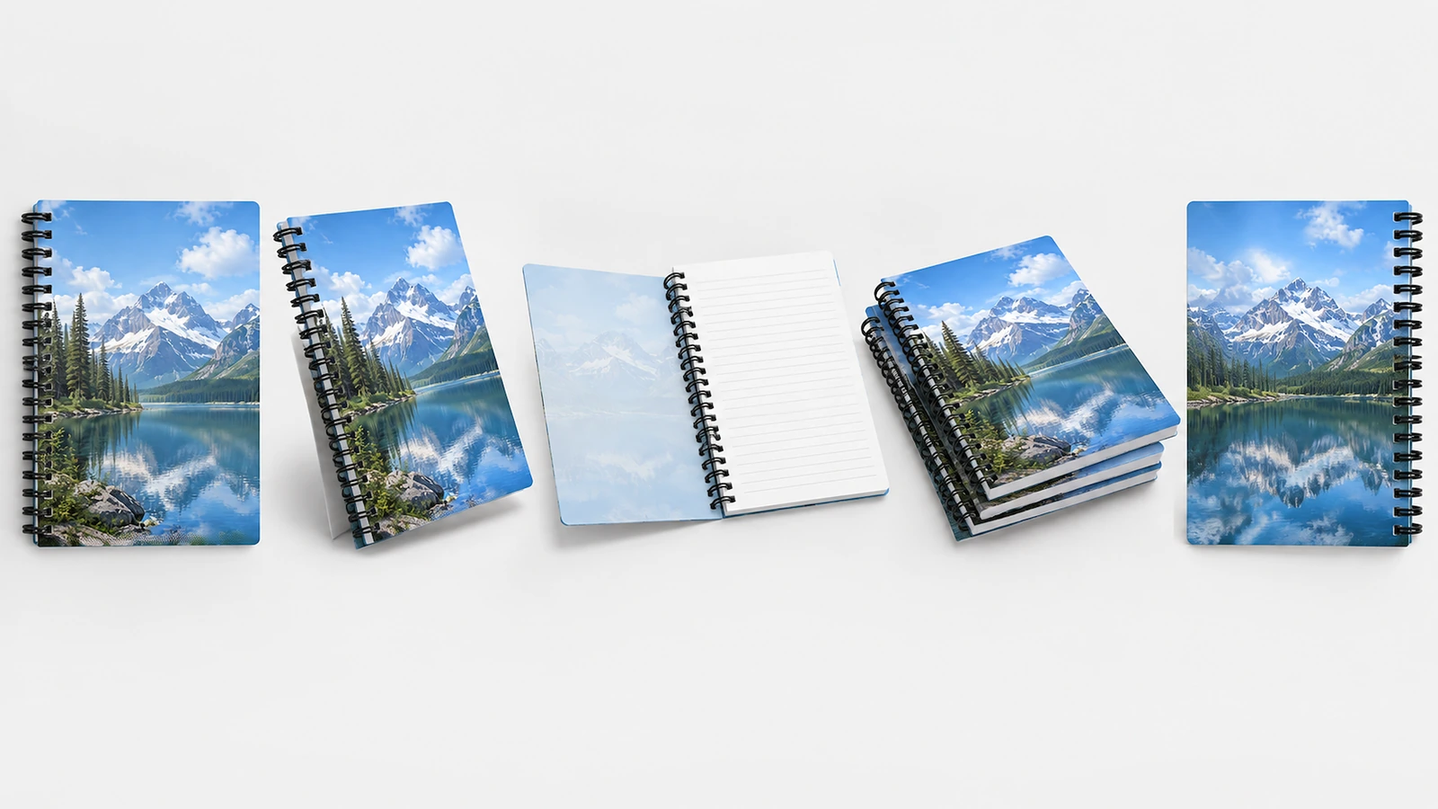 Imagen ilustrativa de una serie de libretas de diseño de lago cerradas, de pie, abiertas y apiladas